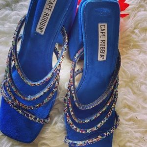 One blue and one black heels